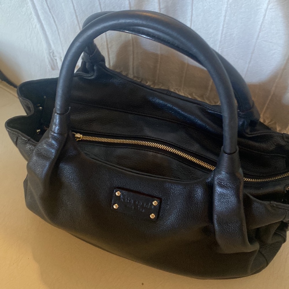 Kate Spade Black Handbag W/Zipper Pocket, And 2 open pockets Inside Handbag